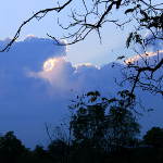 artistic photo of sunlight through stormclouds